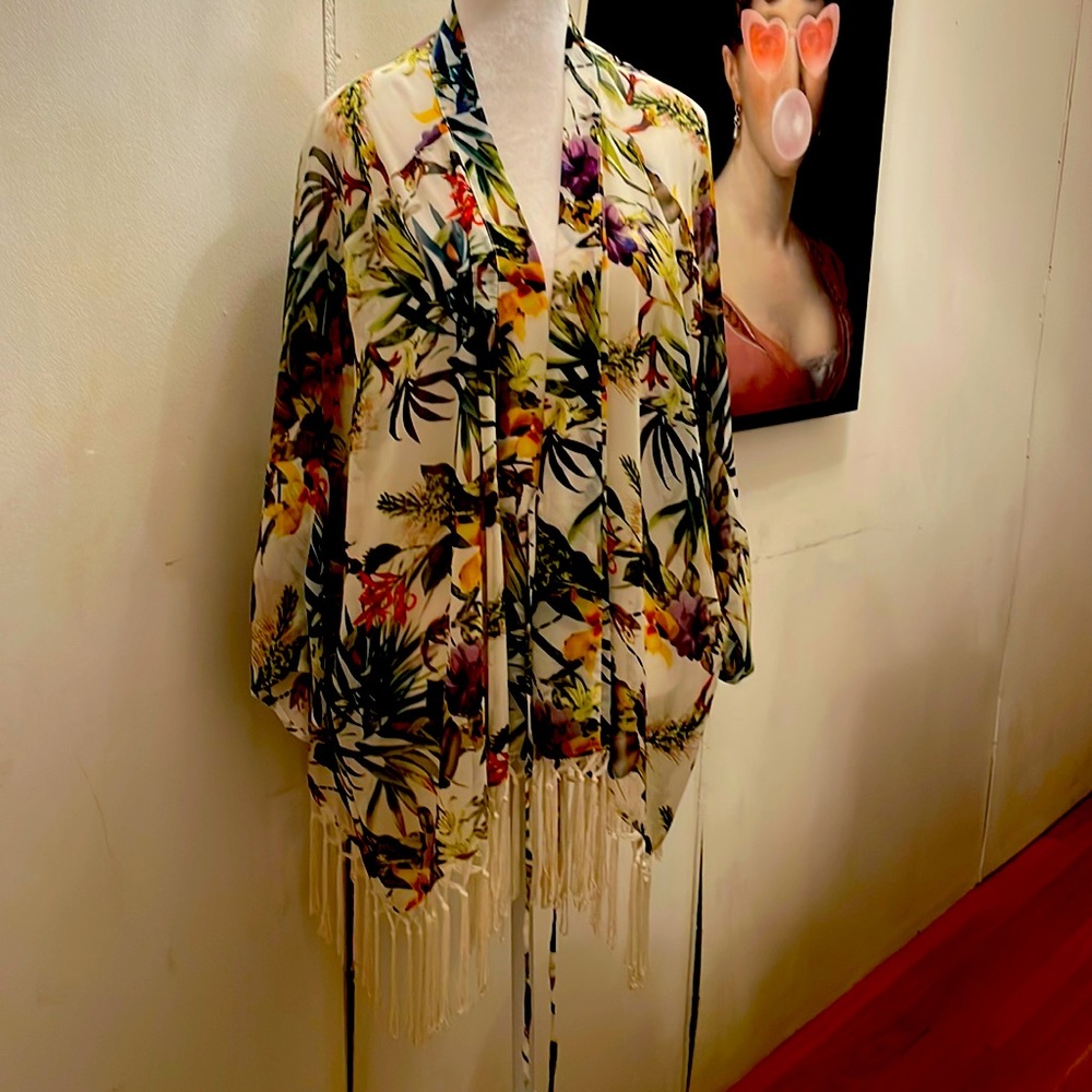 Carmen Marc Valvo printed over top